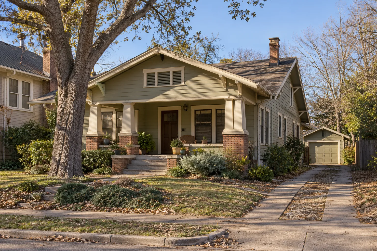 Craftsman bungalow with a deep porch and a rear detached garage in Fort Worth, TX